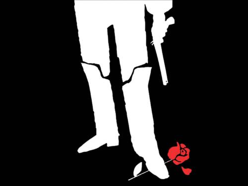 eine weiße Silhouette vor schwarzem Hintergrund: zwei Beine in hohen Stiefeln. In der linken Hand eine Pistole. Unter dem linken Stiefel eine rote Rose